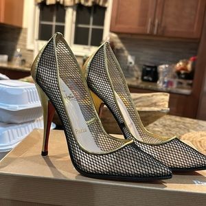 Fishnet red bottoms with gold